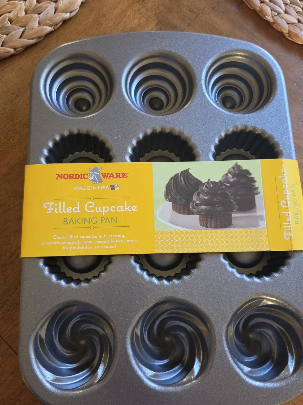 Brand new Nordic Ware Filled Cupcake Baking Pan with the original paper sleeve